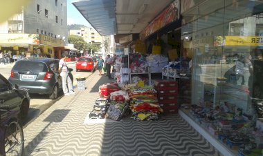 O que passa na cabeça deste comerciante?